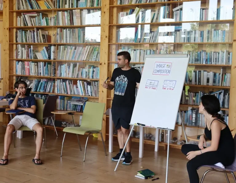 Fabio Meazza leading a visual facilitation workshop in a library